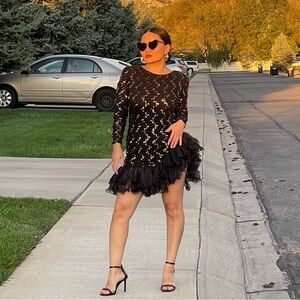 Stand out in this 80s Dave and Johnny asymmetrical sequin dress—vintage glam!